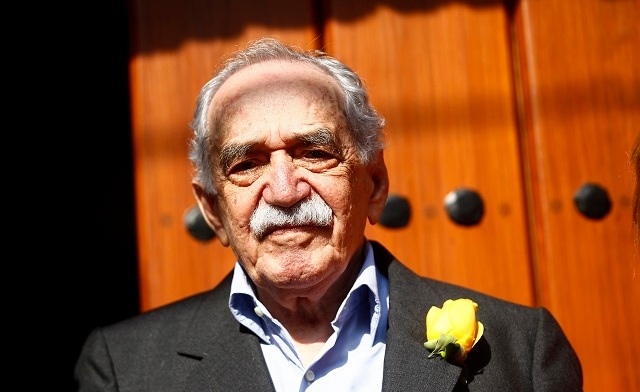 Colombian author Gabriel Garcia Marquez stands outside his house on his 87th birthday in Mexico City